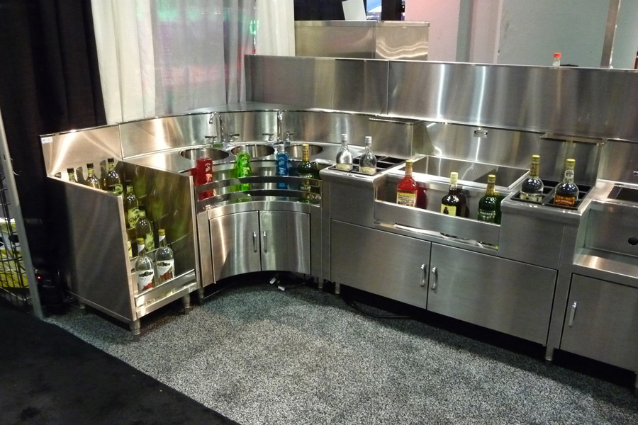 image of NAFEM trade show booth showing custom backbar equipment configuration